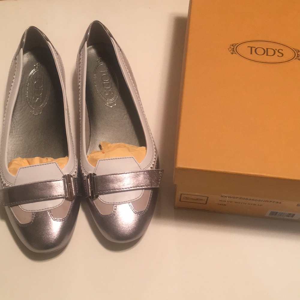 Tod's Silver wave with strap loafers.